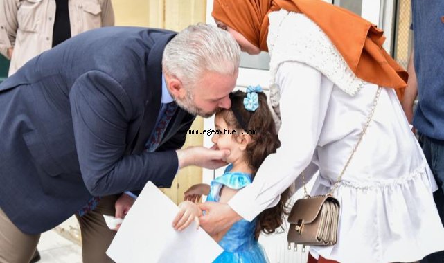 Pehlivan belediye personeliyle bayramlaştı