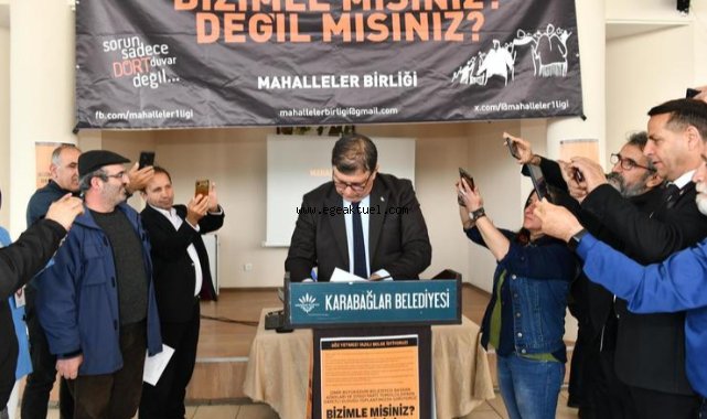 Başkan Tugay kentsel dönüşüm mağdurlarıyla buluştu