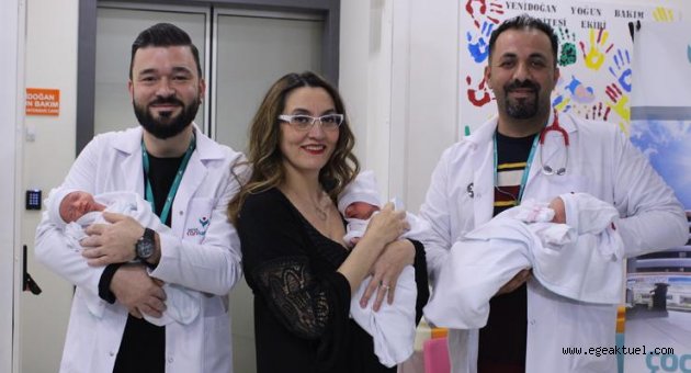 50 yaşında üçüzleri kucağına aldı