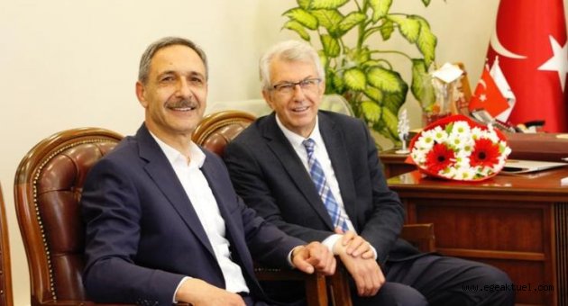 AK Partili aday, kazanan CHP'li başkanı ziyaret etti 