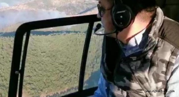 Bakan Pakdemirli, İzmir'deki orman yangını bölgesini havadan inceledi