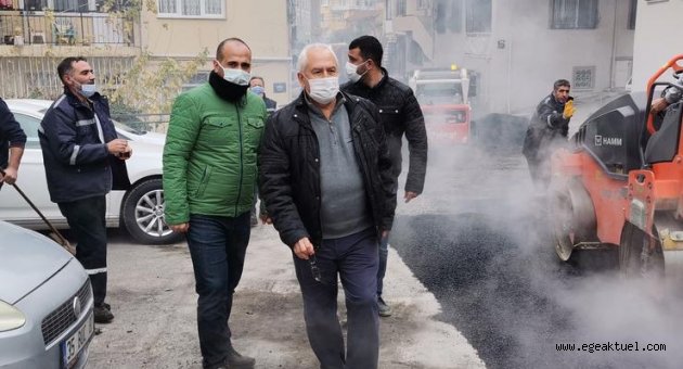 Karabağlar'da boş sokaklarda asfalt atağı