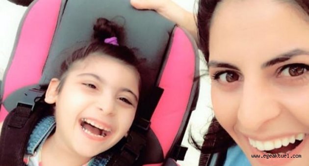 Nisa'nın fizik tedavisi için sarma sarıyor